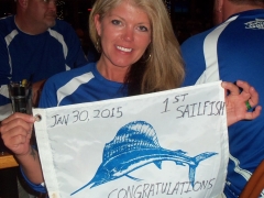 Wendy Coates closeup with 1st Sailfish Flag