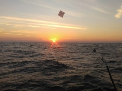 Kite fishing at sunrise