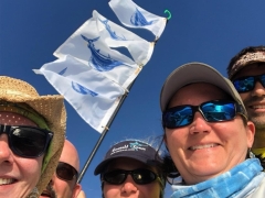 Team Where to Next Selfie with Sailfish Flags